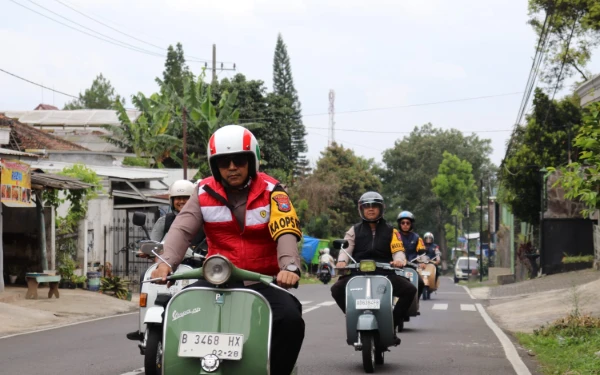 ‎Mengenal AKBP Andi Yudha Pranata, Kapolres Batu Hobi Naik Vespa  ‎