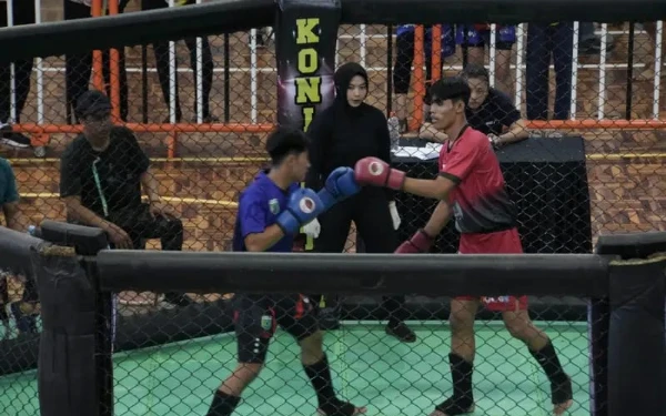 Thumbnail Berita - Petarung MMA Kota Batu Sabet Emas di Porprov IX Jatim, Meski Terganggu Kekacauan Jadwal
