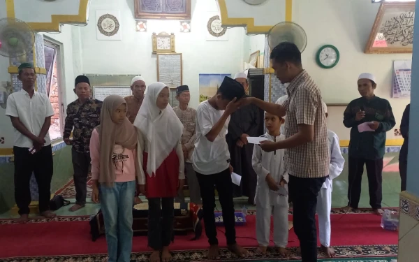 Thumbnail Berita - Momentum 1 Muharram dan Hari Bhayangkara, Polda Sumsel Bersama Wartawan Tebar Kepedulian untuk Anak Yatim