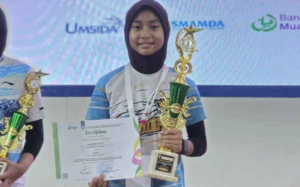 Thumbnail Berita - 7 Kali Juara! Kisah Aqila, Bintang Bulu Tangkis Cilik SD Muhammadiyah 4 Surabaya di ME Confest 2025