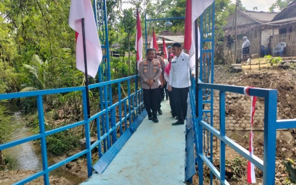 Thumbnail Berita - Jembatan Merah Putih Presisi: Wujud Nyata Sinergi Polres dan Pemkab Tuban untuk Warga Pelosok Bangilan